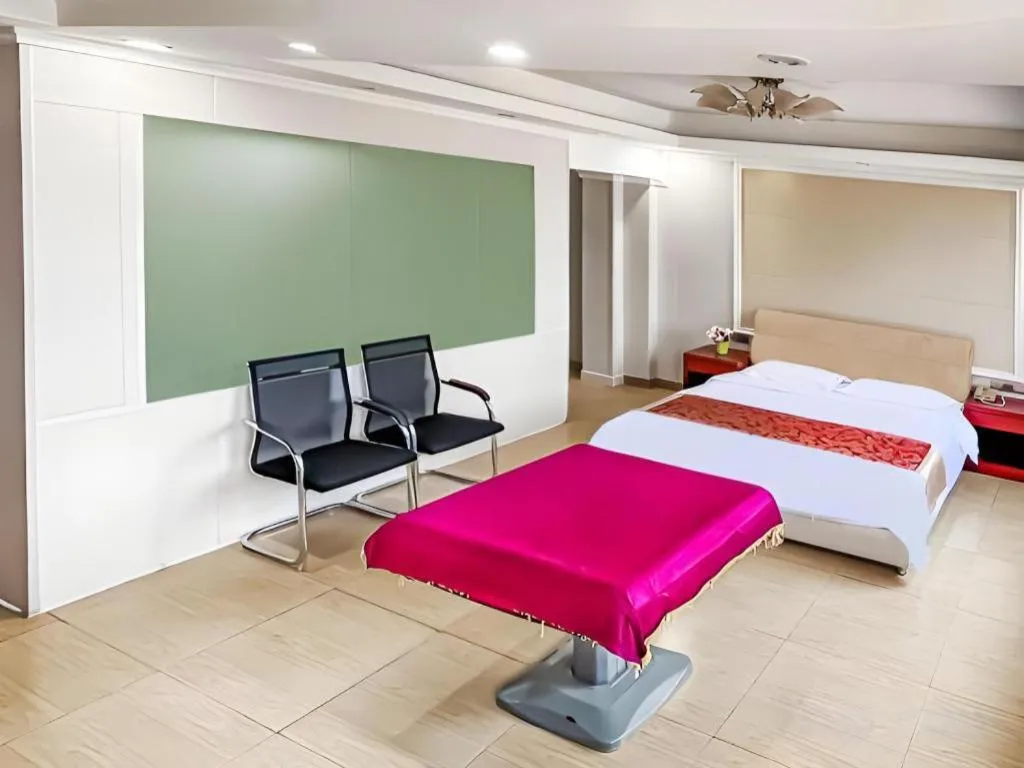 Bed in Jian Guo Grand Hotel