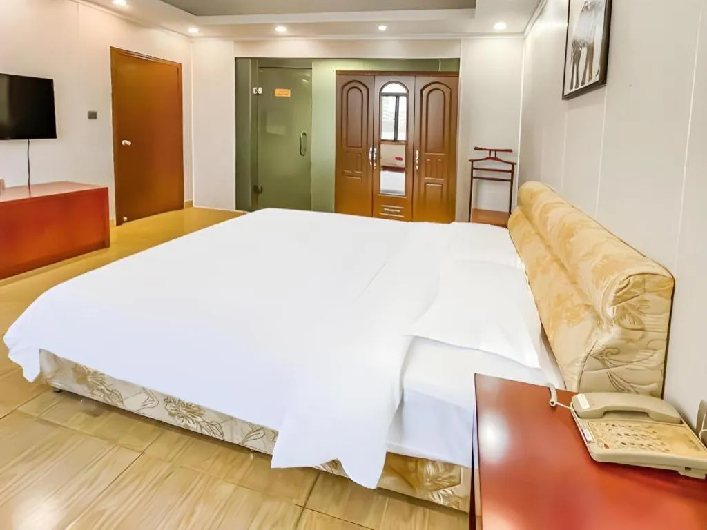 Bed in Jian Guo Grand Hotel