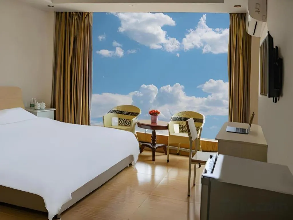 Bed in Jian Guo Grand Hotel