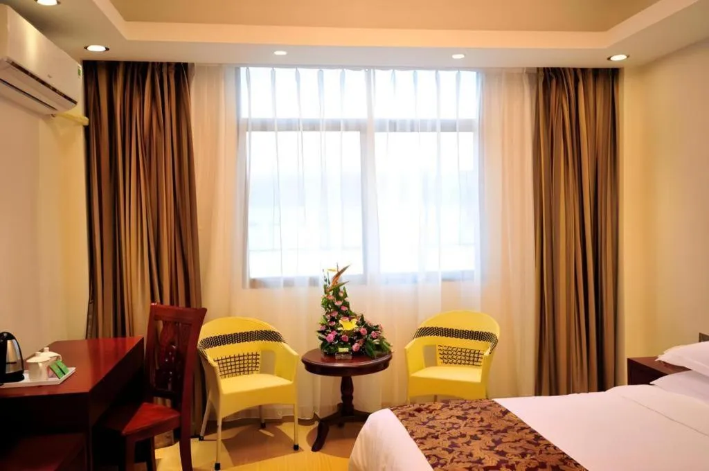 Bed in Jian Guo Grand Hotel