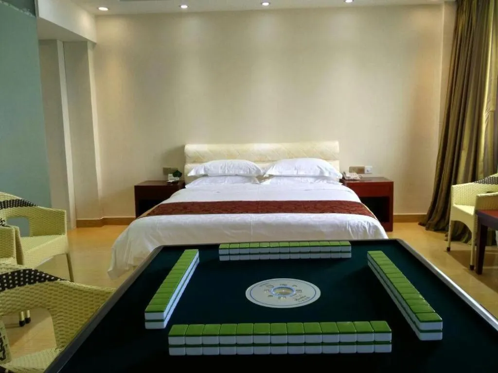 Bed in Jian Guo Grand Hotel