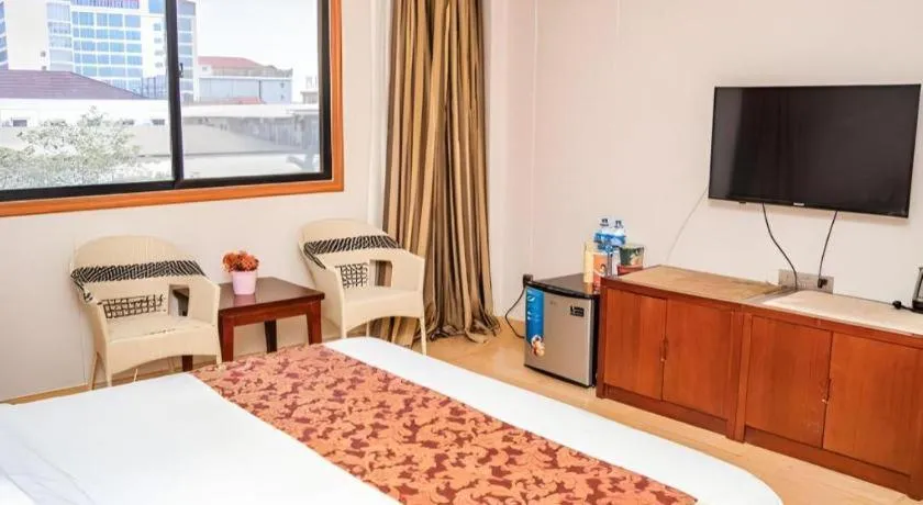 Bed in Jian Guo Grand Hotel