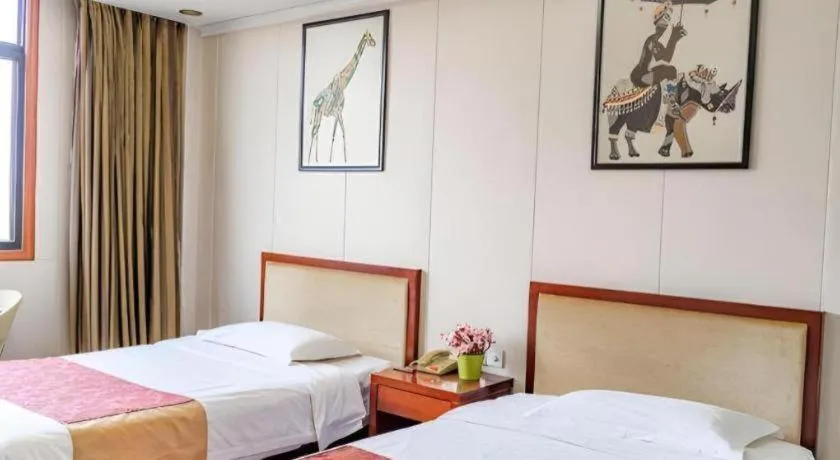 Bed in Jian Guo Grand Hotel