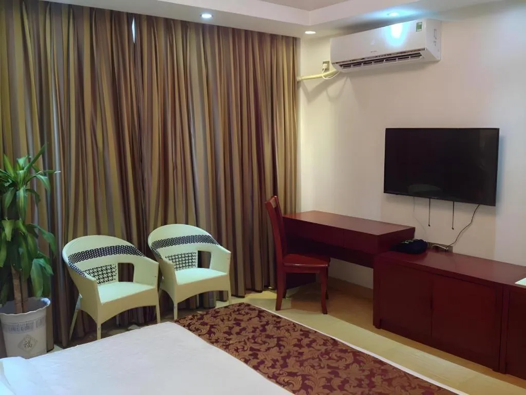 Bed in Jian Guo Grand Hotel