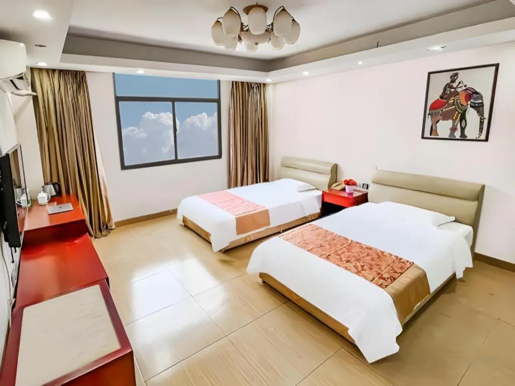 Bed in Jian Guo Grand Hotel