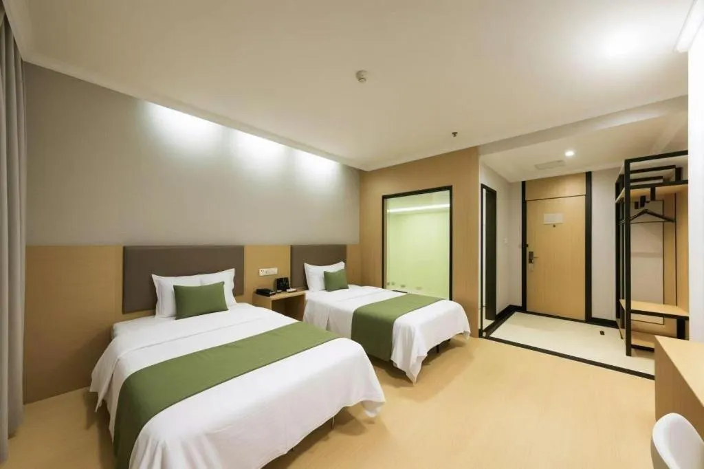 Bed in GreenTree Inn Jiangsu Suzhou Kunshan Beimen Road Express Hotel