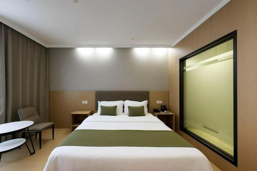 Bed in GreenTree Inn Jiangsu Suzhou Kunshan Beimen Road Express Hotel