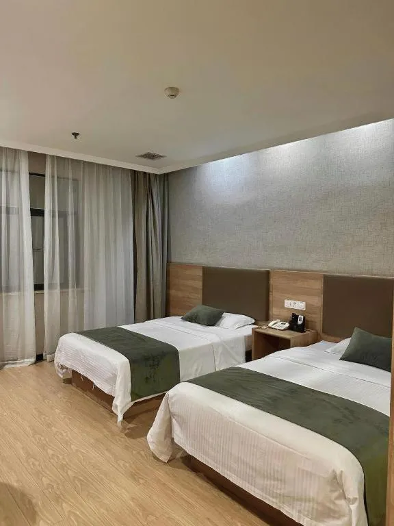 Bed in GreenTree Inn Jiangsu Suzhou Kunshan Beimen Road Express Hotel