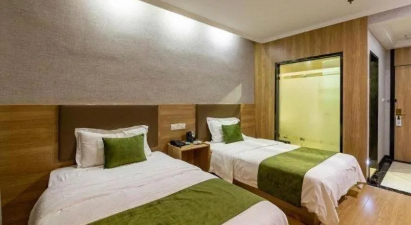 Bed in GreenTree Inn Jiangsu Suzhou Kunshan Beimen Road Express Hotel