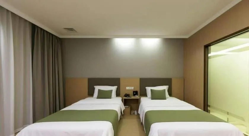 Bed in GreenTree Inn Jiangsu Suzhou Kunshan Beimen Road Express Hotel
