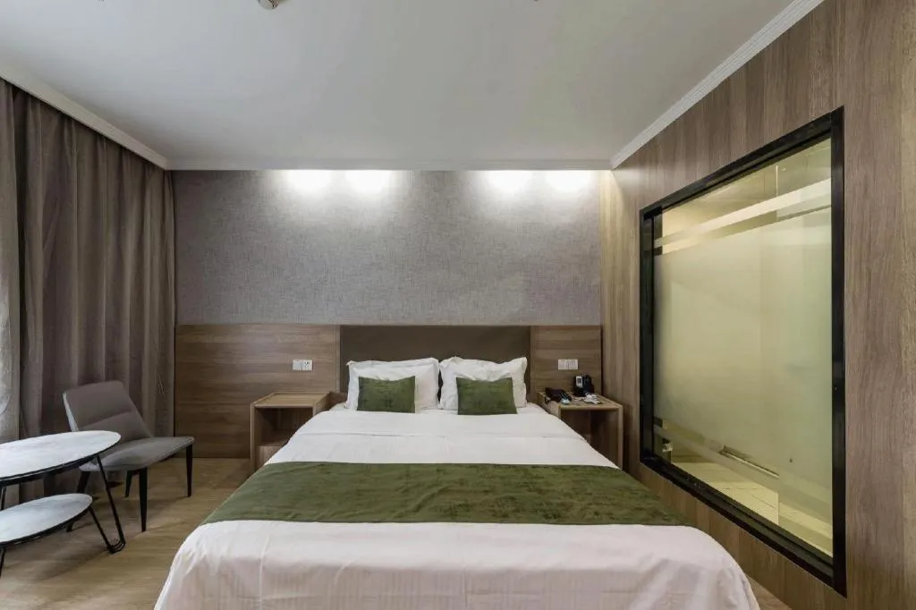 Bed in GreenTree Inn Jiangsu Suzhou Kunshan Beimen Road Express Hotel