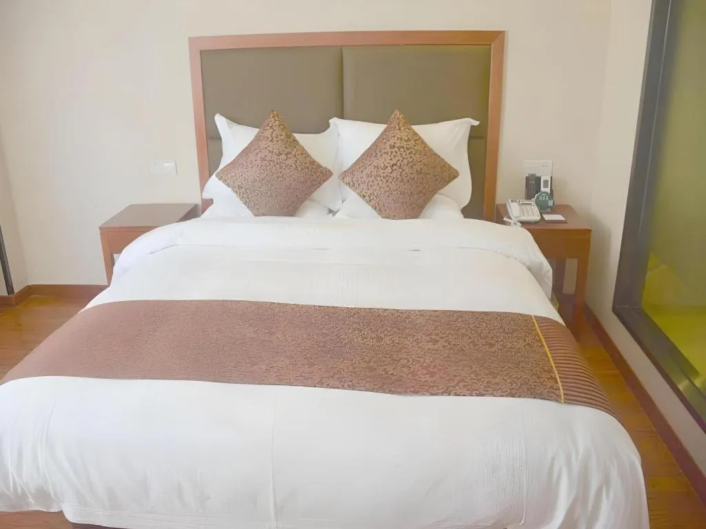 Bed in GreenTree Inn Jiangsu Suzhou Kunshan Beimen Road Express Hotel