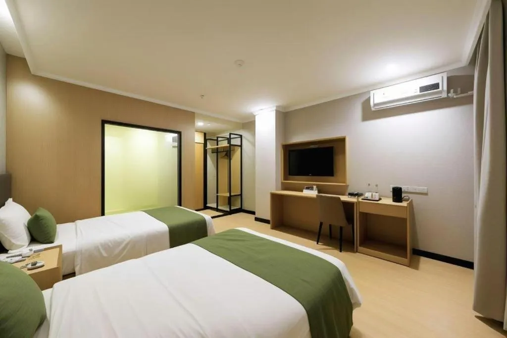 Bed in GreenTree Inn Jiangsu Suzhou Kunshan Beimen Road Express Hotel