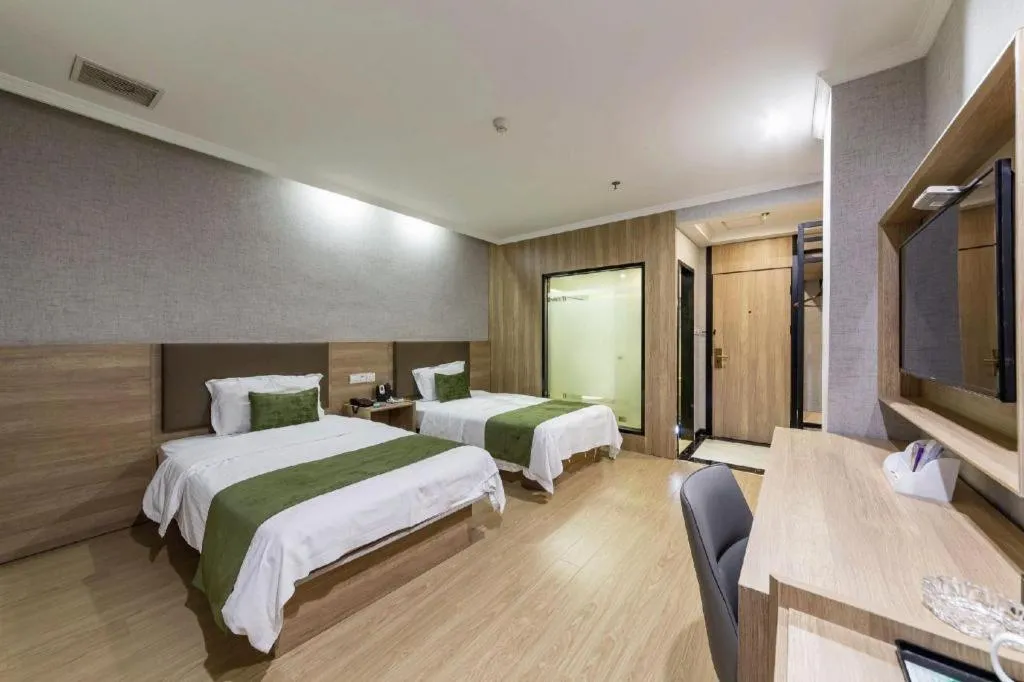 Bed in GreenTree Inn Jiangsu Suzhou Kunshan Beimen Road Express Hotel