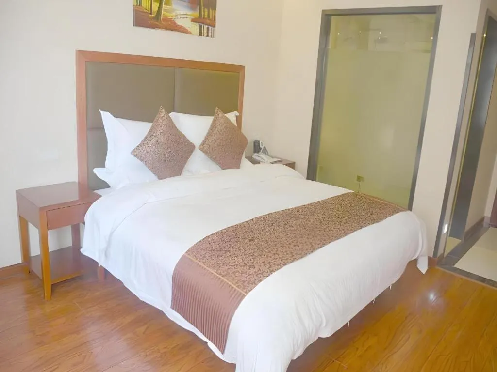 Bed in GreenTree Inn Jiangsu Suzhou Kunshan Beimen Road Express Hotel