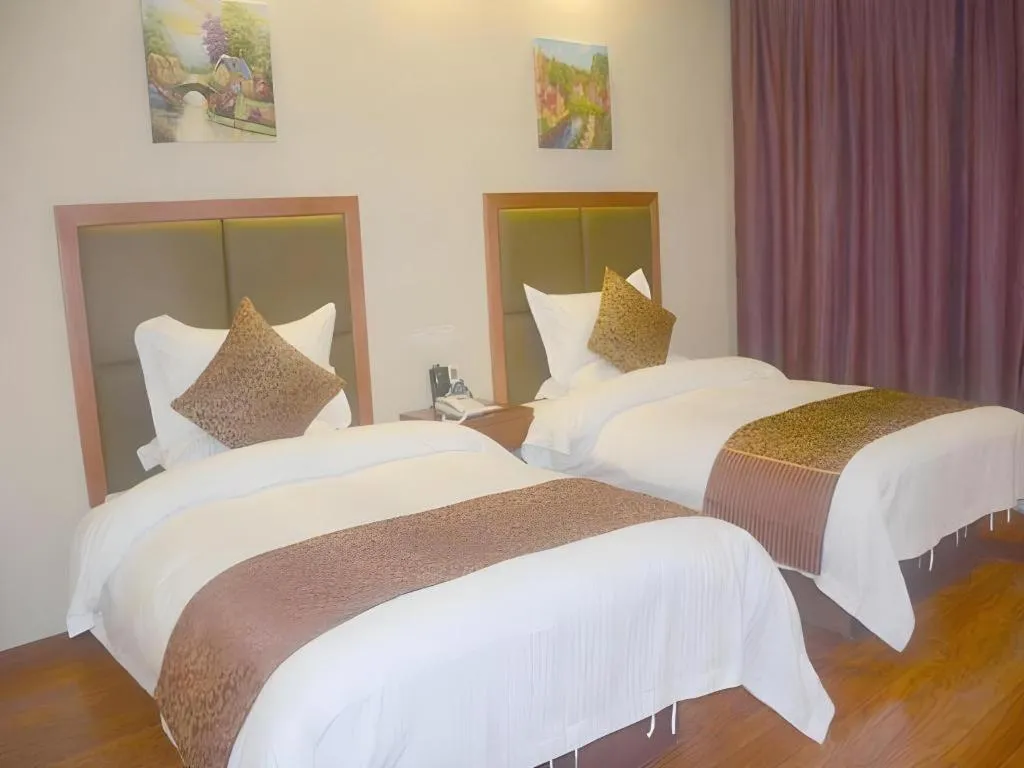 Bed in GreenTree Inn Jiangsu Suzhou Kunshan Beimen Road Express Hotel