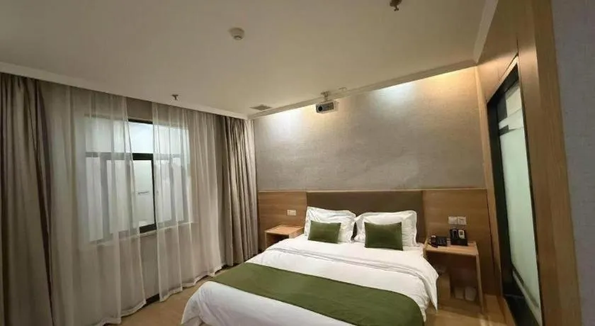 Bed in GreenTree Inn Jiangsu Suzhou Kunshan Beimen Road Express Hotel