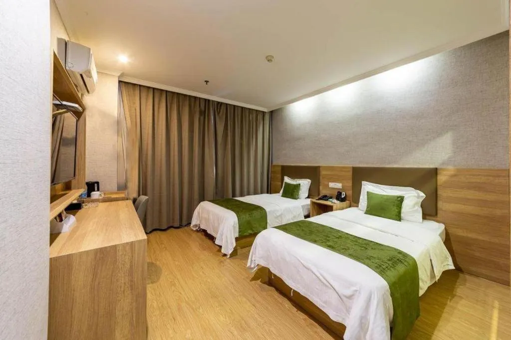Bed in GreenTree Inn Jiangsu Suzhou Kunshan Beimen Road Express Hotel