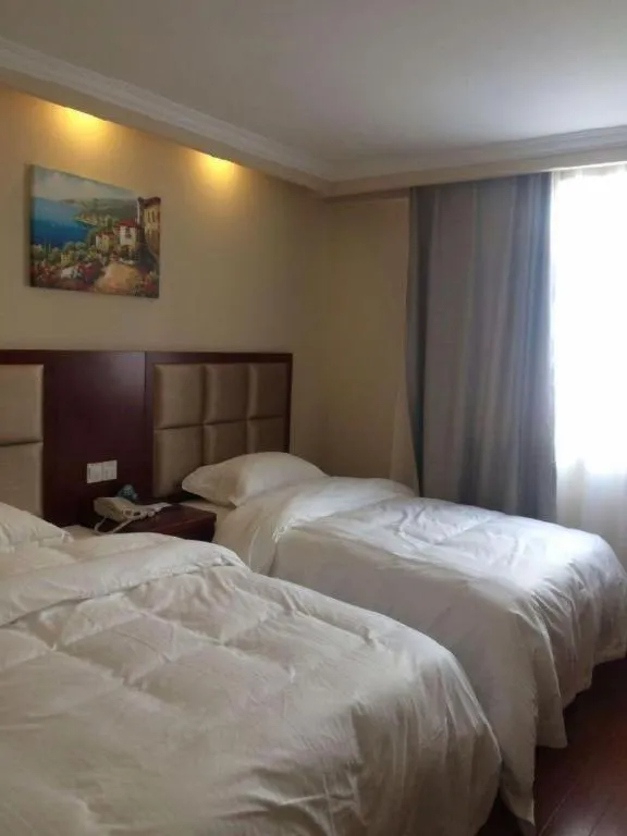 Bed in GreenTree Inn Suzhou Guanqian Street Leqiao Metro Station