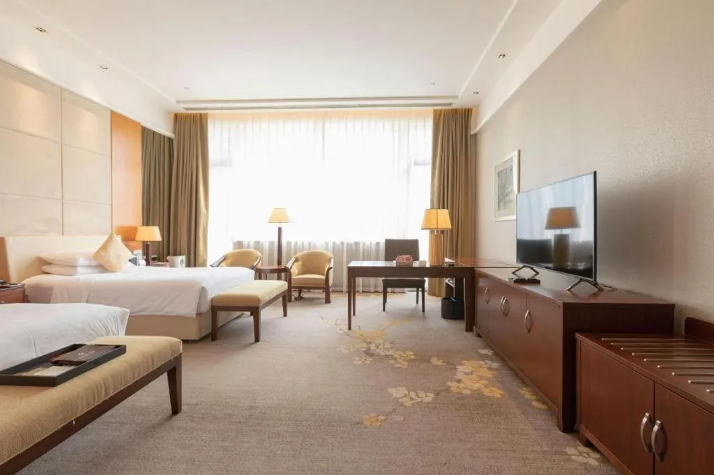 Bed in Suzhou Jinji Lake Grand Hotel