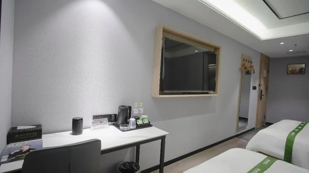 Bed in GreenTree Inn LiaoCheng LinQing HaiShan Building Express Hotel