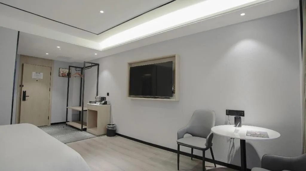 Bed in GreenTree Inn LiaoCheng LinQing HaiShan Building Express Hotel