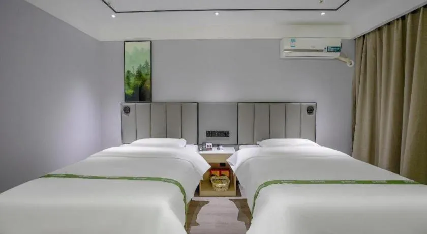 Bed in GreenTree Inn LiaoCheng LinQing HaiShan Building Express Hotel