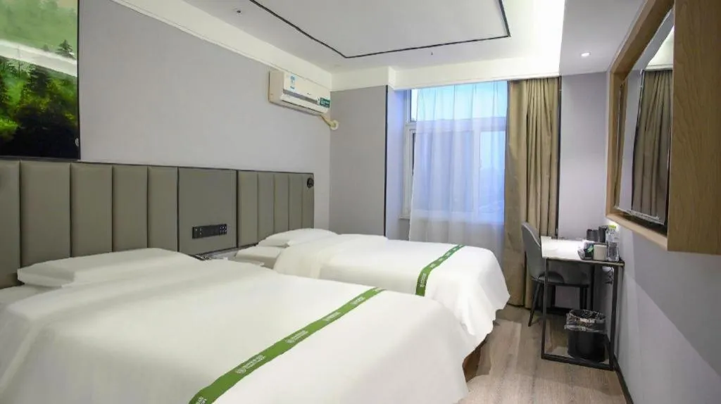 Bed in GreenTree Inn LiaoCheng LinQing HaiShan Building Express Hotel