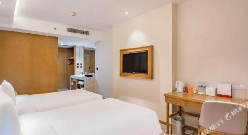 Bed in Gtel Rock City Qingdao Hotel