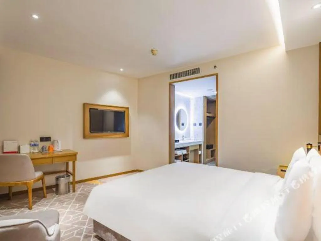 Bed in Gtel Rock City Qingdao Hotel