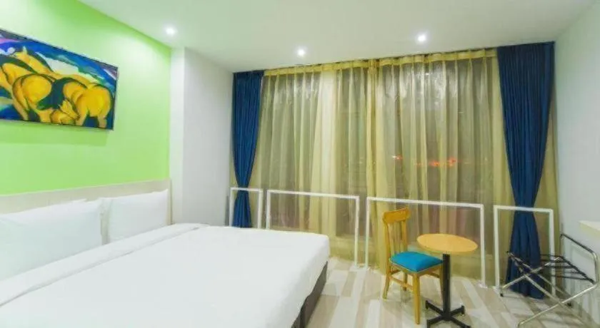 Bed in Gtel Rock City Qingdao Hotel