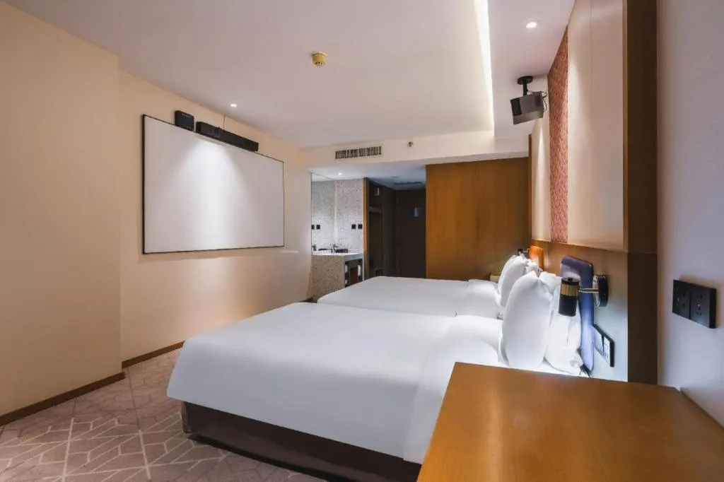 Bed in Gtel Rock City Qingdao Hotel