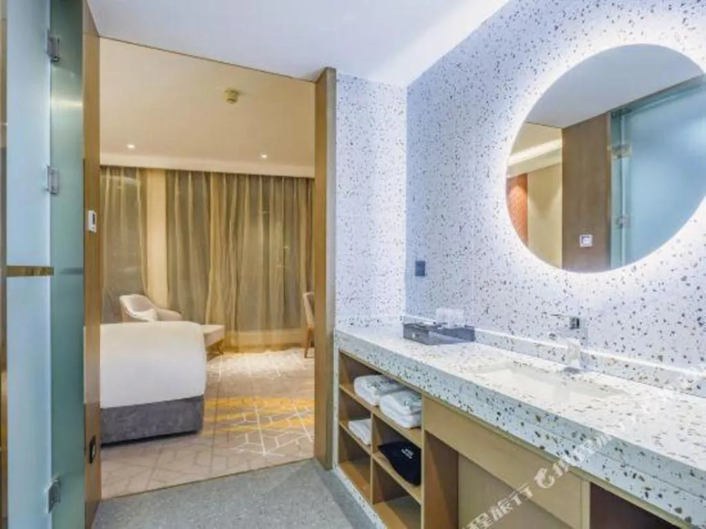 Bed in Gtel Rock City Qingdao Hotel