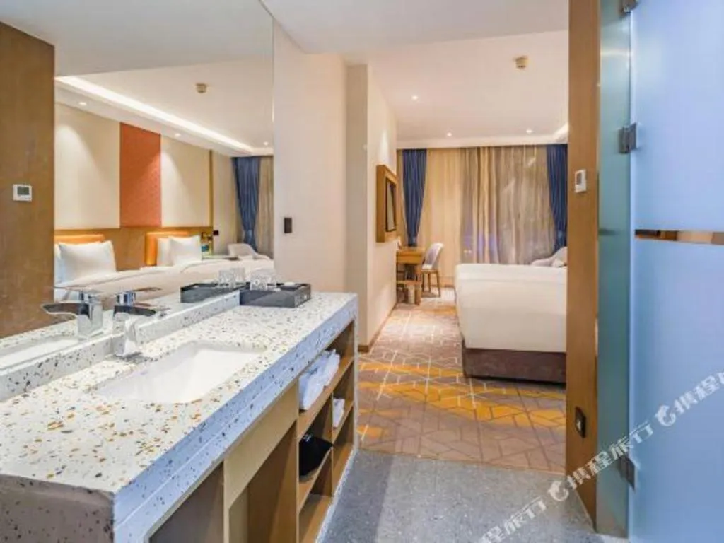 Bed in Gtel Rock City Qingdao Hotel