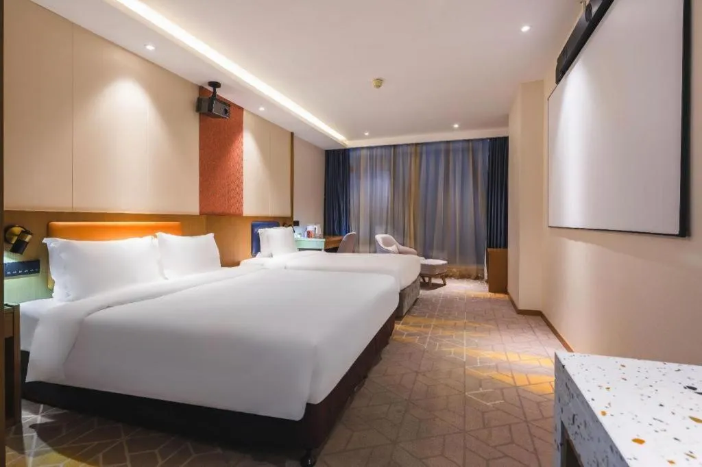 Bed in Gtel Rock City Qingdao Hotel