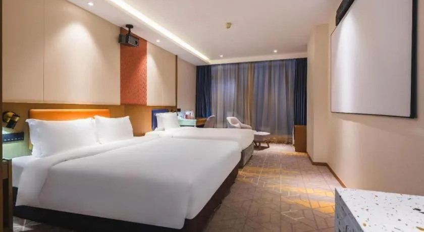 Bed in Gtel Rock City Qingdao Hotel