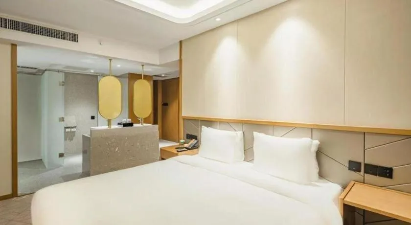 Bed in Gtel Rock City Qingdao Hotel