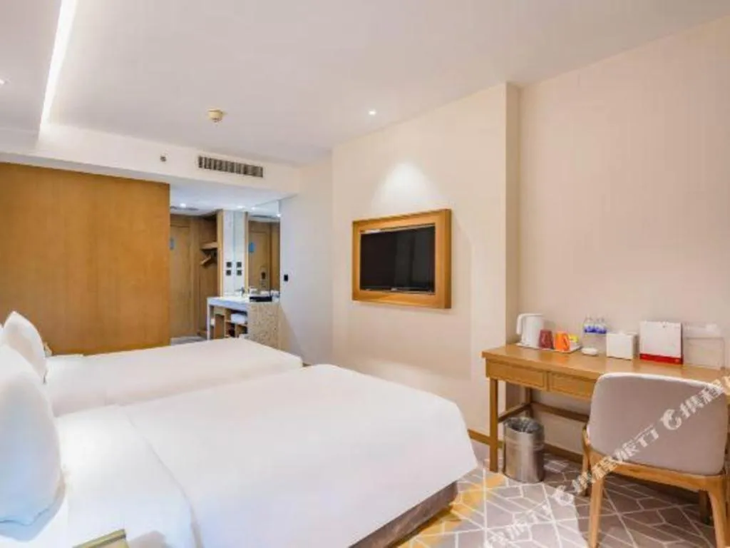 Bed in Gtel Rock City Qingdao Hotel