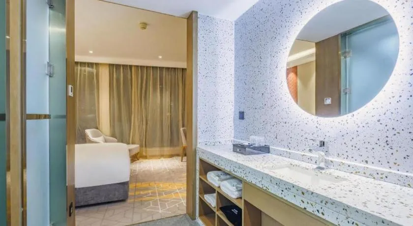 Bed in Gtel Rock City Qingdao Hotel