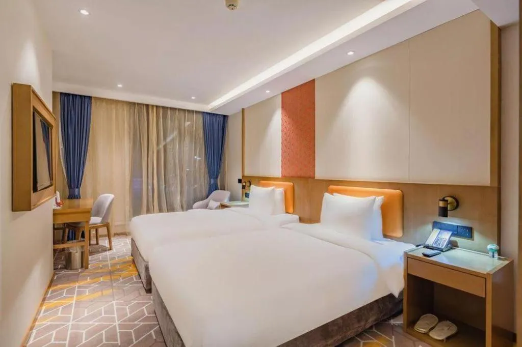 Bed in Gtel Rock City Qingdao Hotel