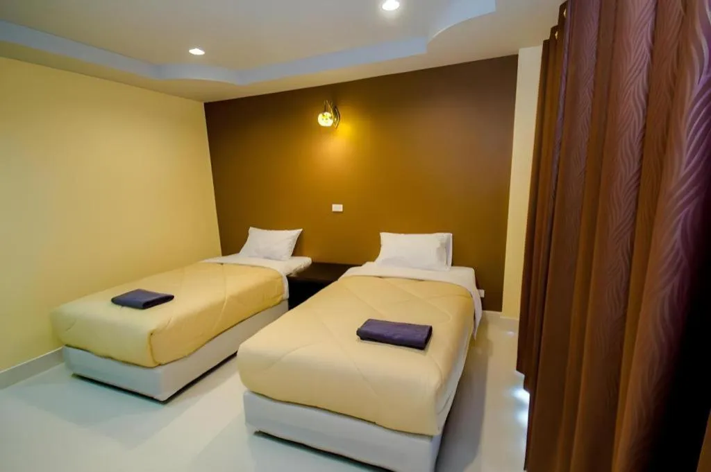 Bed in Maladee Hotel