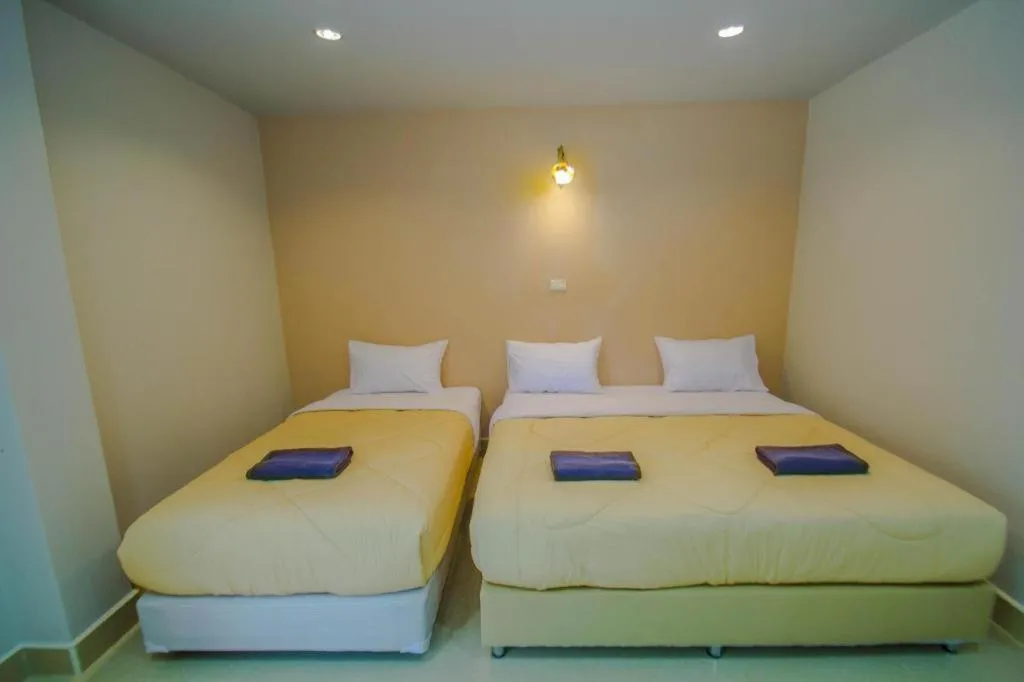 Bed in Maladee Hotel