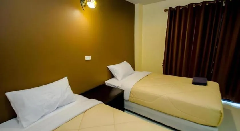 Bed in Maladee Hotel