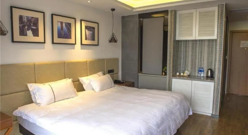 Bed in Muyra Hotel Shanghai