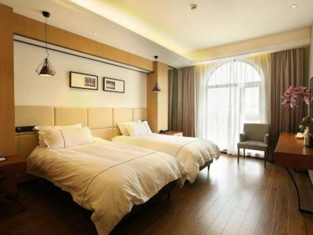 Bed in Muyra Hotel Shanghai