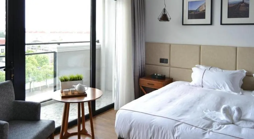 Bed in Muyra Hotel Shanghai