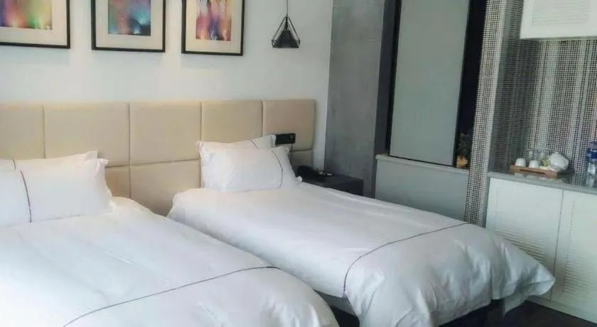 Bed in Muyra Hotel Shanghai