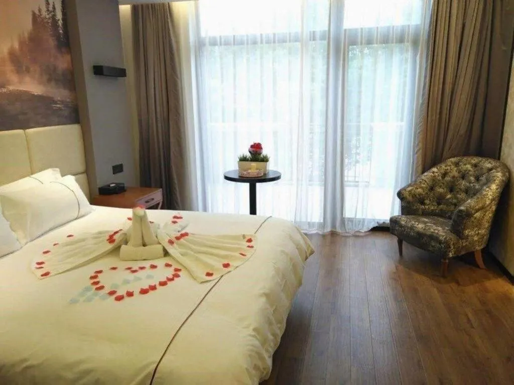 Bed in Muyra Hotel Shanghai