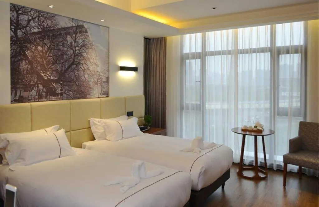 Bed in Muyra Hotel Shanghai