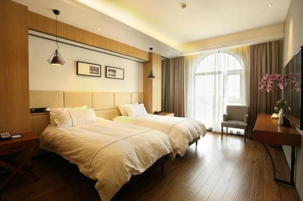 Bed in Muyra Hotel Shanghai